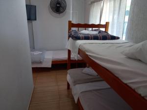 Postel nebo postele na pokoji v ubytování POUSADA ALEFER