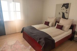 Postel nebo postele na pokoji v ubytování Residenz am Berg