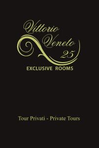 a sign for a hotel with a gold logo at Vittorio Veneto 25 in Modena