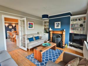 Posezení v ubytování Wren Cottage