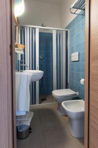 Koupelna v ubytování Hotel Ancore