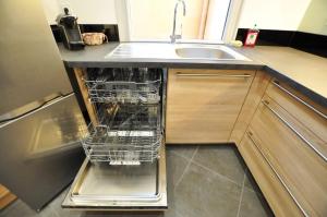 O bucătărie sau chicinetă la Le Patio - Appartement 2 chambres dans le meilleur quartier de Perpignan