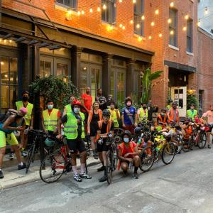 a group of people with bikes on a street at Apple Hostels of Philadelphia in Philadelphia