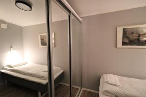 Postel nebo postele na pokoji v ubytování RIBO Apartment Aurora