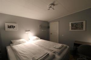 Postel nebo postele na pokoji v ubytování RIBO Apartment Aurora