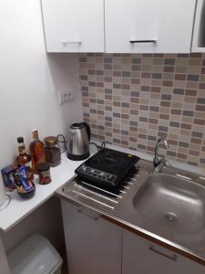 Dapur atau dapur kecil di Deluxe studio & apartments Alexander