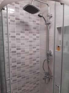 Bilik mandi di Deluxe studio & apartments Alexander