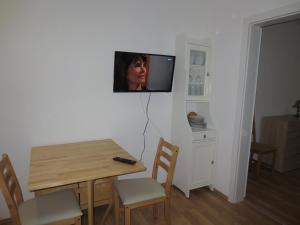 TV a/nebo společenská místnost v ubytování Landhaus Ziegelstadel