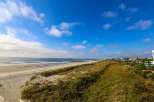a view of the beach from the shoreline at Sunshine Daydream in Folly Beach +42 photos
