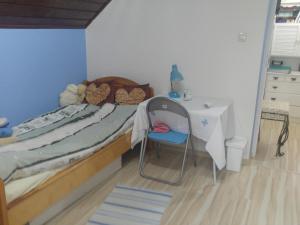 A bed or beds in a room at WiktorJan AGROTURYSTYKA