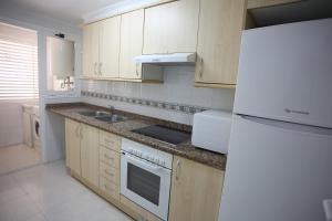 Kuchyňa alebo kuchynka v ubytovaní Apartamento caribe