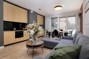 Kuchyňa alebo kuchynka v ubytovaní Exclusive Apartments Mostowa by Renters Prestige