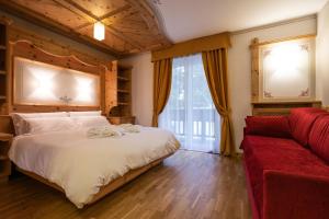 Posteľ alebo postele v izbe v ubytovaní Hotel Medil