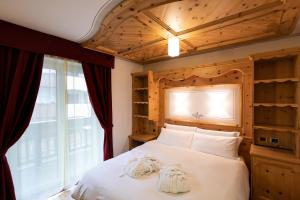 Posteľ alebo postele v izbe v ubytovaní Hotel Medil