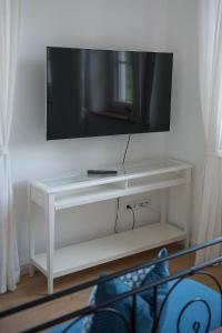 TV a/nebo společenská místnost v ubytování Landgut zur Mühle