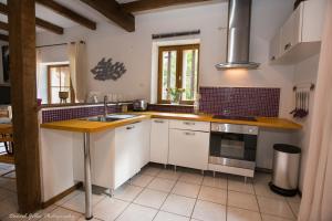 A kitchen or kitchenette at Domaine de Beaufort