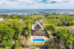 an aerial view of a house with a swimming pool at 512 E Cooper-The Wave House in Folly Beach