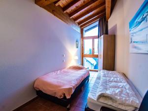 Säng eller sängar i ett rum på Luxurious apartment near the pistes in family-friendly St François Longchamp