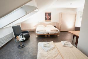 슈타트호텔 엥겔 객실 침대