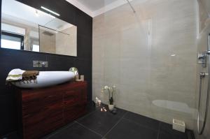Kúpeľňa v ubytovaní Luxury Villa Luminosa