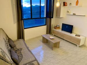 Telewizja i/lub zestaw kina domowego w obiekcie Casa Monny Fuerteventura Holiday Wi-Fi
