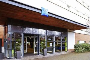 a building with a sign on the front of it at ibis budget Birmingham Centre in Birmingham