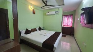 Katil atau katil-katil dalam bilik di JR Guest Home