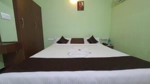 Katil atau katil-katil dalam bilik di JR Guest Home