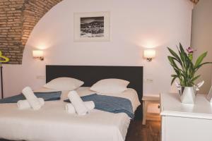 Posteľ alebo postele v izbe v ubytovaní Old Town Inn