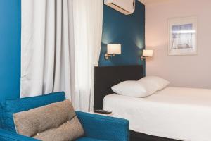 Posteľ alebo postele v izbe v ubytovaní Old Town Inn