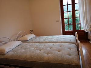 Katil atau katil-katil dalam bilik di Fenecchio