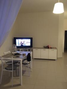 TV a/nebo společenská místnost v ubytování La Panoramica