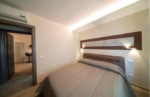 Krevet ili kreveti u jedinici u okviru objekta Blue Moon - Via Parigi Apartments