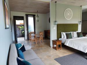 Postel nebo postele na pokoji v ubytování Bali Sila Bisma + 36 fotografií