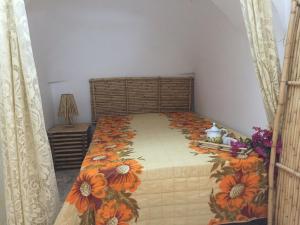 Tempat tidur dalam kamar di Chateaux des Trulli