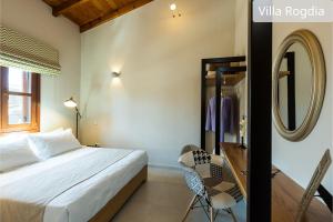 Postel nebo postele na pokoji v ubytování Atsipopoulo Villas