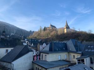a view of a town with houses and buildings at Youth Hostel Vianden in Vianden