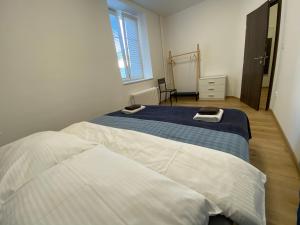 Postel nebo postele na pokoji v ubytování No. 34