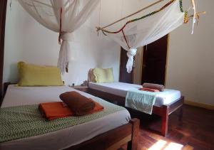 Voodi või voodid majutusasutuse Ruby - Casa de Hospedes - Backpackers toas