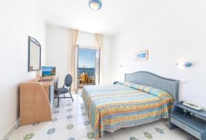 Postel nebo postele na pokoji v ubytování Hotel Citara