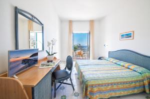 Postel nebo postele na pokoji v ubytování Hotel Citara