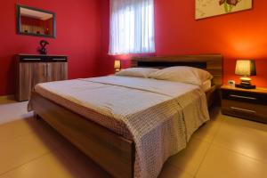 Postel nebo postele na pokoji v ubytování Montenegro Apartments Utjeha