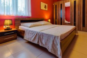 Postel nebo postele na pokoji v ubytování Montenegro Apartments Utjeha