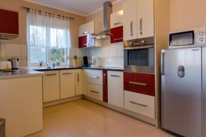 Kuchyň nebo kuchyňský kout v ubytování Montenegro Apartments Utjeha