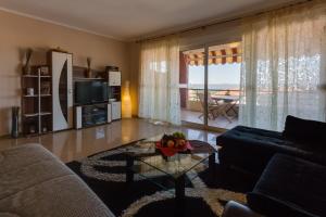 Posezení v ubytování Montenegro Apartments Utjeha