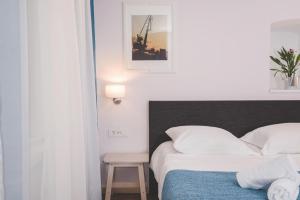 Posteľ alebo postele v izbe v ubytovaní Old Town Inn
