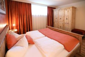 Posteľ alebo postele v izbe v ubytovaní Chalet Claudia