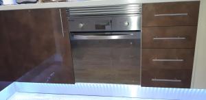 A kitchen or kitchenette at PARQUE SANTIAGO 1 LUXURY APARTAMENT (Playa de las Américas)