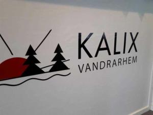 a sign on a wall that reads kahl vardeneland at STF Kalix Vandrarhem in Kalix