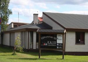a building with a sign in front of it at STF Kalix Vandrarhem in Kalix